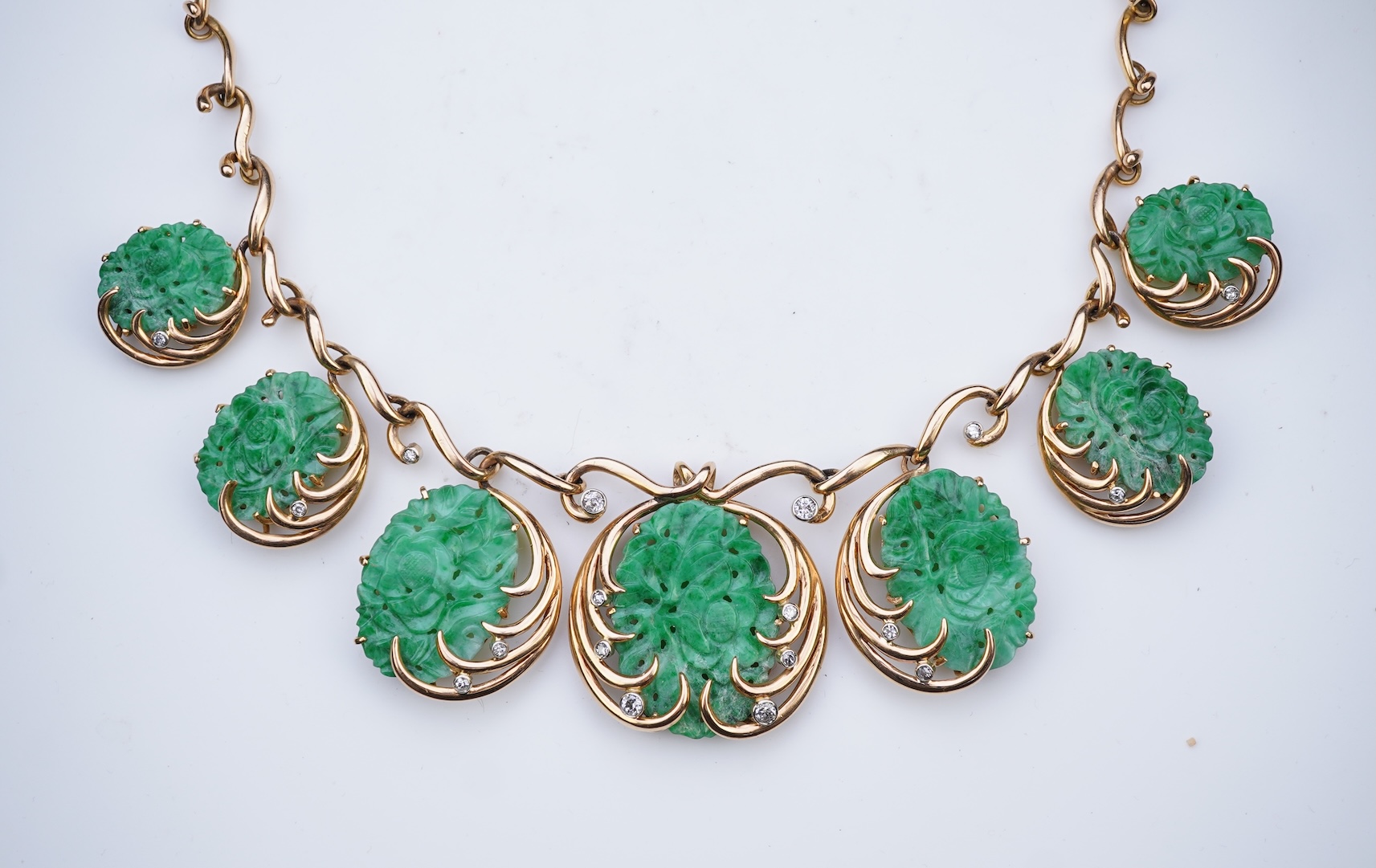 A jadeite and diamond necklace, mid 20th century